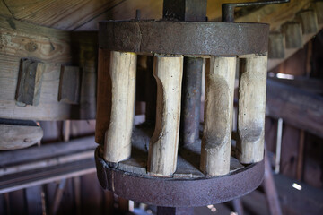 A wooden structure with a metal base and a wooden top
