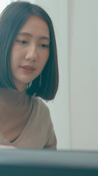 Vertical Screen : Closeup group Adult Asia male, female freelance meeting write prompt AI bot app program nomad, video game, talk strategy, discuss plan, user interface, data center desktop computer.