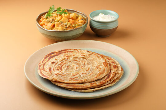 Vegetable Kurma and paratha or malabar parota