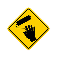 Fototapeta premium A yellow caution sign featuring a black silhouette of a hand reaching towards a paint roller.