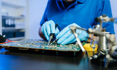 Electronics technician, electronic engineering electronic repair, electronics measuring and testing, repair and maintenance concepts.