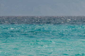 Beautiful turquoise and blue, wavy sea texture