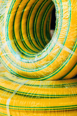 Garden pipe hose rolled up, gardening equipment