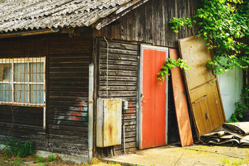 Old worn prefabricated wooden house detail