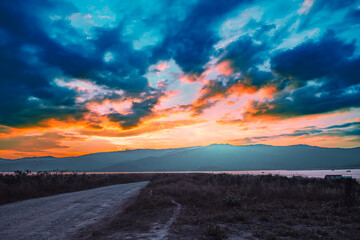 Natural Series : Beautiful natural view of Doi Tao Lake during sunset in Chiang Mai Province, Thailand. View of the sky and mountains with beautiful evening light.