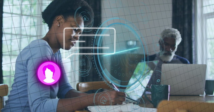 Image of message and fingerprint over african american woman and man sitting at table, working