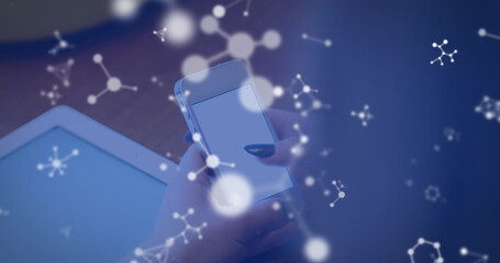 Image of molecules over hands of caucasian woman using smartphone