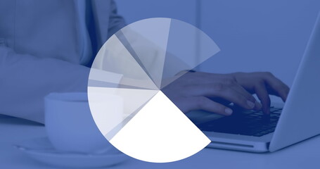 Image of pie chart rotating in loop over midsection of caucasian businessman using laptop