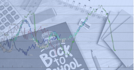 Image of line graph and welcome back to school text on tablet screen with stationery on table © vectorfusionart