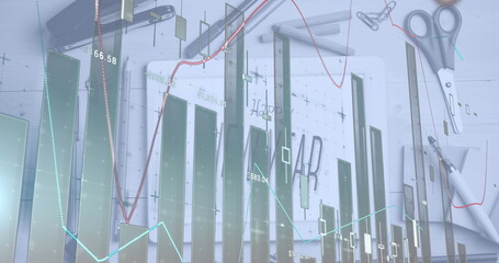 Image of graphs over digital tablet with happy new year drawing and stationery on table © vectorfusionart