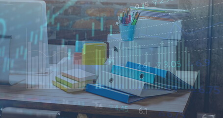 Image of graphs and charts processing data over stationery and computer on office desk