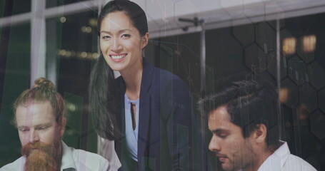 Image of statistics and financial data processing over diverse business people