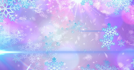 Image of light spots over snow falling