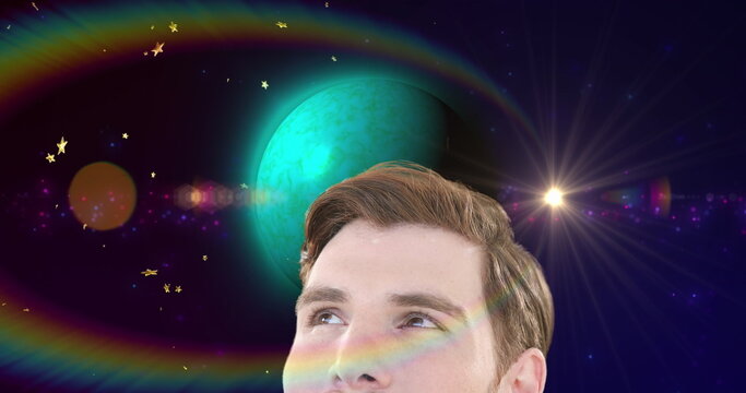 Image of stars and moon over caucasian man