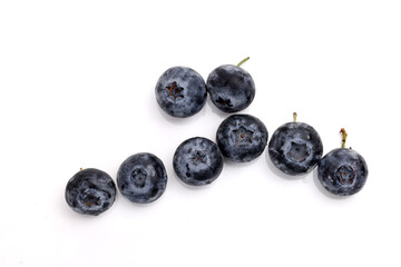 Fresh ripe whole blueberries on white background blue berry
