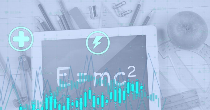 Image of icons with graph over digital tablet with equation, stationery and apple on table
