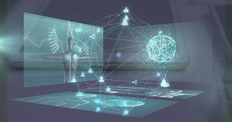 Projecting holographic interface above laptop on desk, with data panels and floating 3D brain model