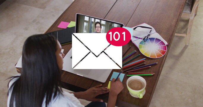 Image of email icon with numbers over caucasian woman on laptop image call