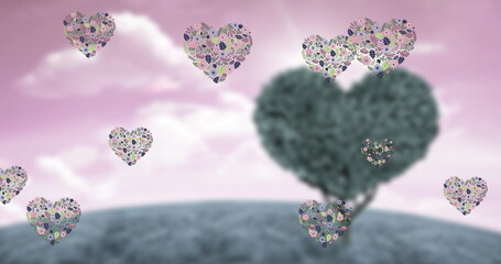Image of heart icons floating over heart tree © vectorfusionart