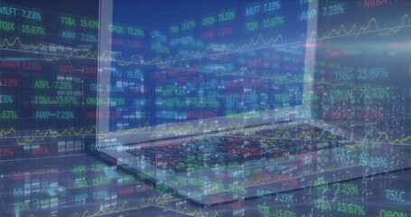 Displaying multicolored stock tickers fluctuating on trading floor with monitors and keyboards