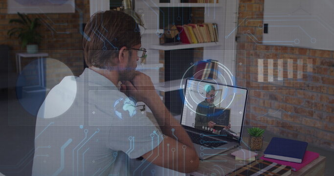 Image of data processing over caucasian male teacher having a image call on laptop - Powered by Adobe