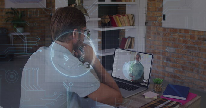 Image of data processing over caucasian male teacher having a image call on laptop