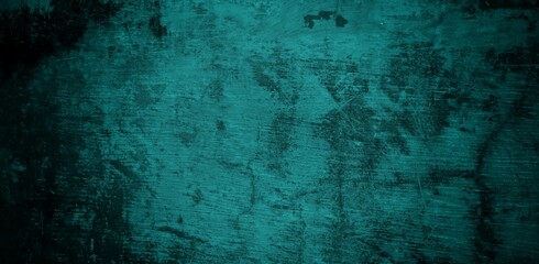  A textured background featuring a deep teal color with a distressed, grunge appearance. The surface shows variations in tone and subtle patterns, creating an abstract and moody aesthetic.