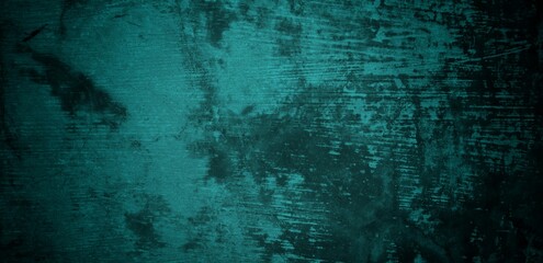  A textured background featuring a deep teal color with a distressed, grunge appearance. The surface shows variations in tone and subtle patterns, creating an abstract and moody aesthetic.