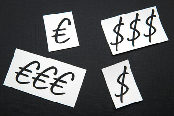 Dollar and Euro currency symbols.
