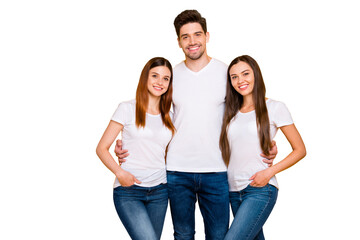 Obraz premium Portrait of charming fellows looking at camera with beaming smile wearing white t-shirt denim jeans isolated over yellow background
