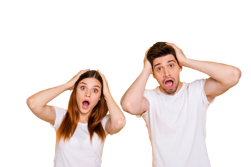 Portrait of astonished people touching their head screaming omg wearing white t-shirt isolated over yellow background