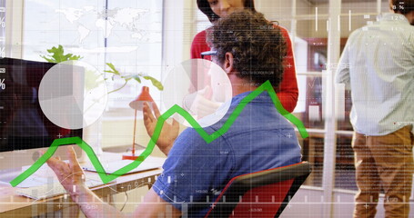 Image of statistics and financial data processing over caucasian businessman in office