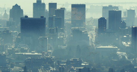 Image of shapes moving over cityscape