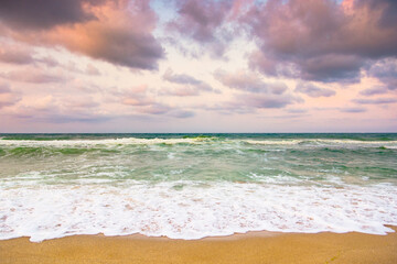 cloudy evening sky at the black sea. travel inspiration. weather change in nature. beautiful orange cloudscape. dramatic summer vacation in europe at the beach