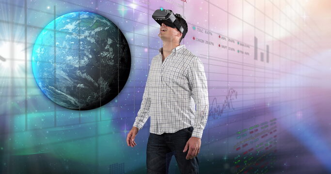 Image of data processing over caucasian man using vr headset - Powered by Adobe