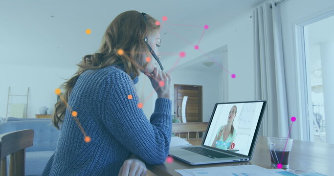 Image of biometric over businesswoman using phone headset and using phone headset - Powered by Adobe
