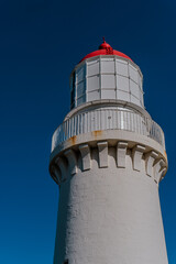 lighthouse on a blue sky