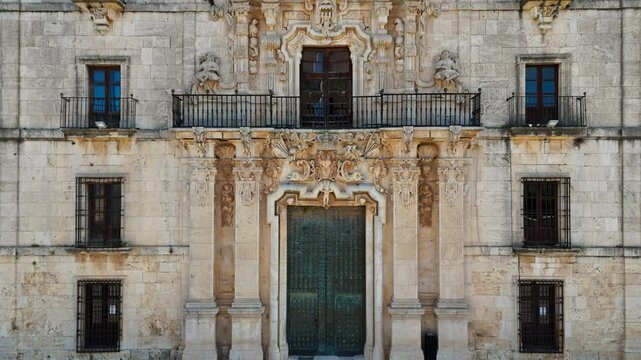 View of the south, baroque facade of the Ucl&eacute;s Monastery in Cuenca, Castilla-La Mancha, Spain, in daylight