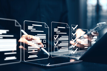 Digital document checklist and online form completion: Close-up of a hand using a stylus on a...