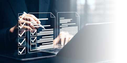 Digital document management and workflow automation: A hand uses a stylus on a tablet, with a...