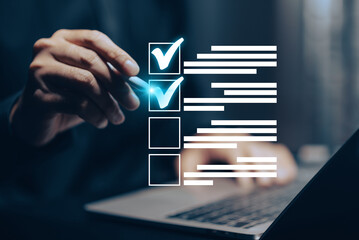 Digital document management and workflow automation: A hand uses a stylus on a tablet, with a...
