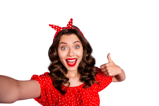 Photo of pretty lady making selfies raising thumb up wear red dress isolated purple background