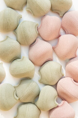 Textured round colored Italian whole grain flour pastes are lined