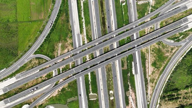 Aerial view of a complex bridge intersection where multiple highway numbers 290 and 304 Nakhon Ratchasima Thailand