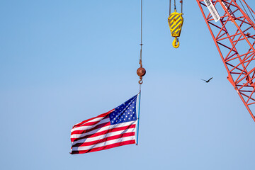 american flag on a blue sky