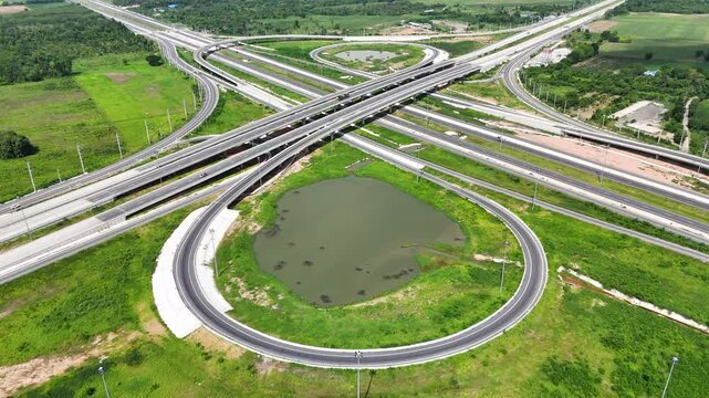 Drone footage of a complex bridge intersection where multiple highway numbers 290 and 304 Nakhon Ratchasima Thailand