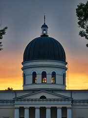 Sunset photo with a church dome in the background 