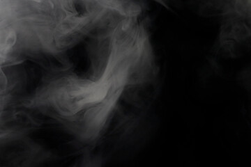 Abstract Smoke Wisps Against a Dark Background