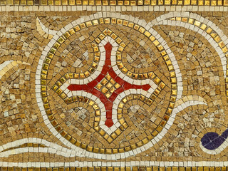 Circular Mosaic Pattern with Colorful Stone Tiles for Creative Backgrounds. Round mosaic pattern on wall. Close-up