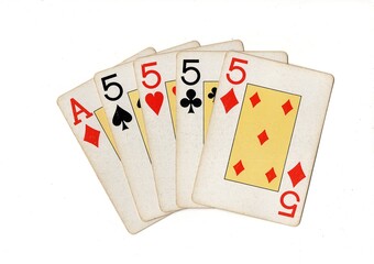 A poker hand of vintage playing cards isolated on a white background.